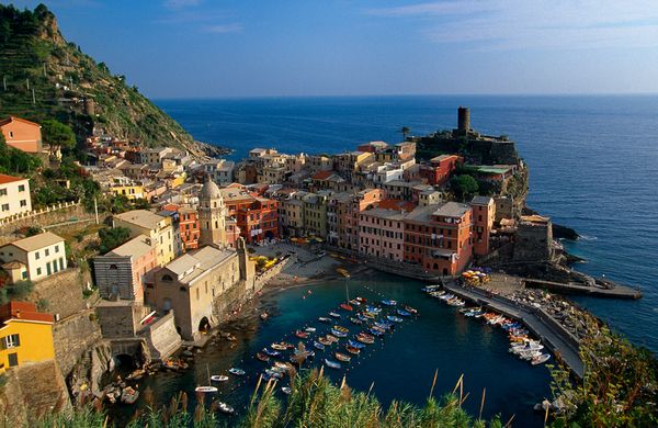 https://www.suntoursinternational.com/wp-content/uploads/2026/02/Colorful-Vernazza-is-one-of-the-five-seaside-villages-in-Cinque-Terre-National-Park.jpg